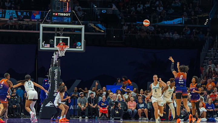 Aug 30, 2025; Phoenix, Arizona, USA; Phoenix Mercury forward Satou Sabally (0) makes a three pointer to extend the lead against the New York Liberty in the second half at Footprint Center. Mandatory Credit: Allan Henry-Imagn Images