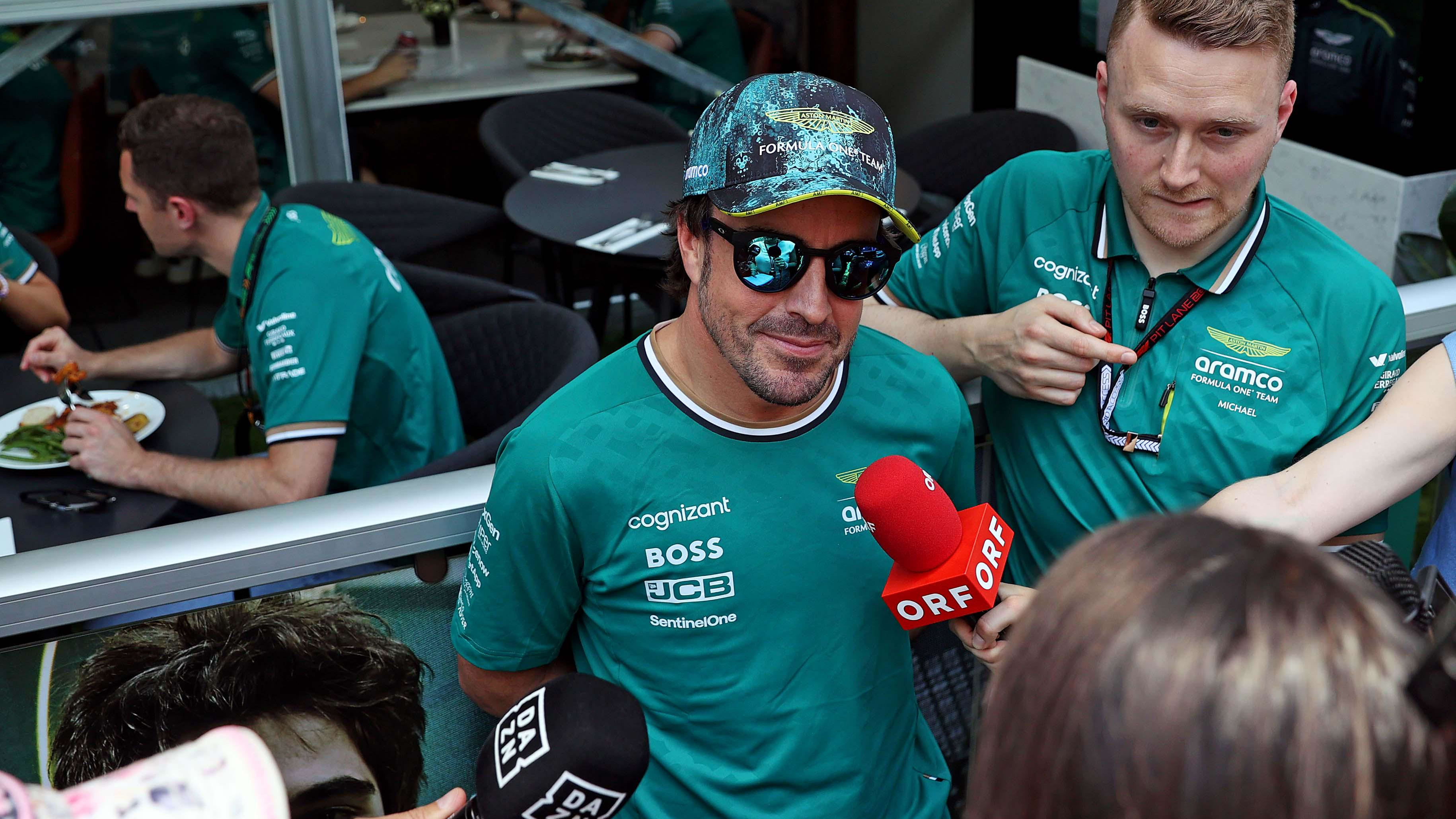 May 2, 2024; Miami Gardens, Florida, USA; Aston Matrin driver Fernando Alonso (14) speaks to the