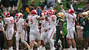 Nov 29, 2025; Waco, Texas, USA; The Houston Cougars celebrate after a play against the Baylor Bears during the second half at McLane Stadium. 