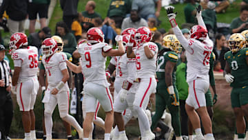Nov 29, 2025; Waco, Texas, USA; The Houston Cougars celebrate after a play against the Baylor Bears during the second half at McLane Stadium. 