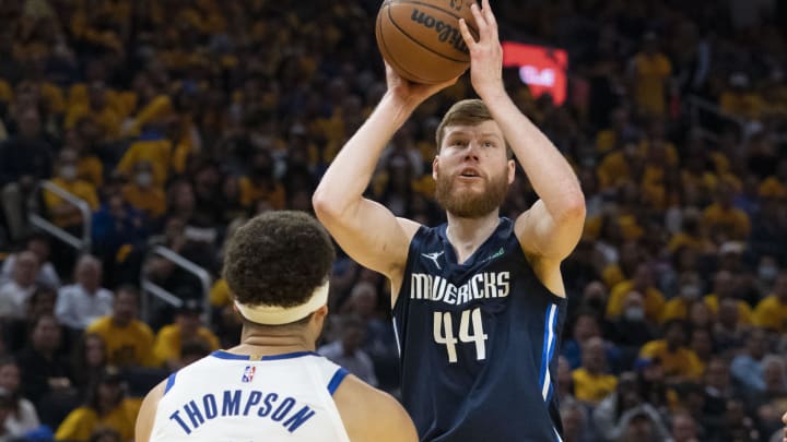 May 20, 2022; San Francisco, California, USA; Dallas Mavericks forward Davis Bertans (44) shoots the basketball against Golden State Warriors guard Klay Thompson (11) during the second quarter in game two of the 2022 western conference finals at Chase Center. Mandatory Credit: Kyle Terada-USA TODAY Sports