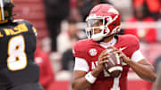 Arkansas Razorbacks quarterback KJ Jackson (7) drops back to pass in the first quarter against the Missouri Tigers at Razorback Stadium.