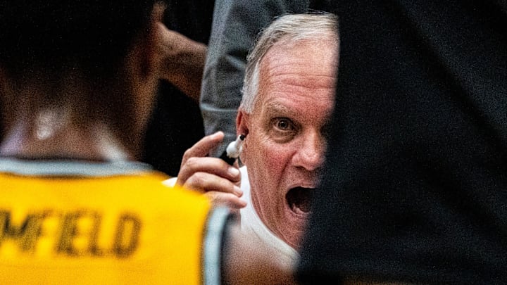 Southern Miss head coach Jay Ladner talks with players in a huddle. Southern Miss head coach Jay Ladner talks with players in a huddle.