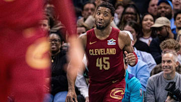 Mar 7, 2025; Charlotte, North Carolina, USA; Cleveland Cavaliers guard Donovan Mitchell (45) reacts after scoring to end the second quarter against the Charlotte Hornets at Spectrum Center. Mandatory Credit: Scott Kinser-Imagn Images
