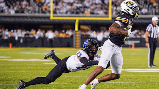 Missouri Tigers wide receiver Theo Wease Jr. (1) runs the ball as Buffalo Bulls cornerback Eddie Pleasant III (21) 