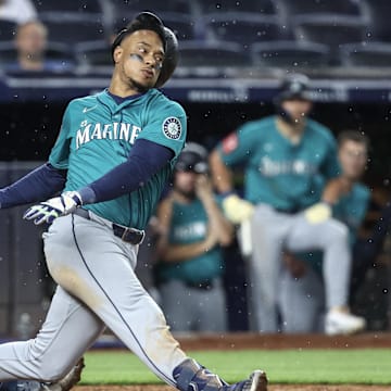 Seattle Mariners designated hitter Jorge Polanco (7) loses his helmet after striking out in the eighth inning against the New York Yankees at Yankee Stadium on July 9. 