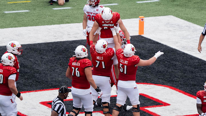 Louisville Cardinals celebrate another touchdown during their game against the Austin Peay Governors on Saturday, Aug. 31, 2024 at L&N Federal Credit Union Stadium in Louisville, Ky.