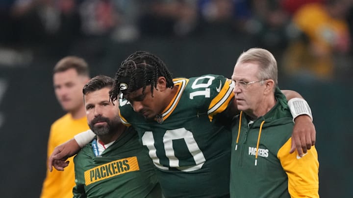 Sep 6, 2024; Sao Paulo, BRA; Green Bay Packers quarterback Jordan Love (10) is assisted off the field after an injury during the second half against the Philadelphia Eagles at Neo Quimica Arena. Mandatory Credit: Kirby Lee-Imagn Images