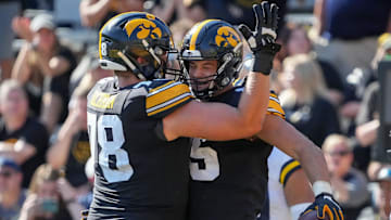 Iowa tight end Luke Lachey, right, celebrates with teammate Mason Richman after scoring a touchdown in the fourth quarter against Michigan during a NCAA college football game at Kinnick Stadium in Iowa City on Saturday, Oct. 1, 2022.

Iowavsmichiganfb 20221001 Bh