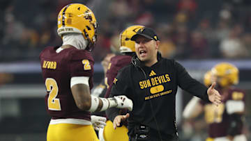 Dec 7, 2024; Arlington, TX, USA;  Arizona State Sun Devils head coach Kenny Dillingham speaks with Arizona State Sun Devils defensive back Xavion Alford (2) during the first half against the Iowa State Cyclones at AT&T Stadium. Mandatory Credit: Kevin Jairaj-Imagn Images
