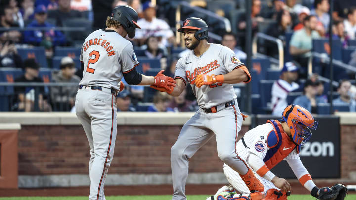 Aug 20, 2024; New York City, New York, USA;  Baltimore Orioles right fielder Anthony Santander (25) is greeted by shortstop Gunnar Henderson (2) after hitting a two-run home run in the first inning against the New York Mets at Citi Field.