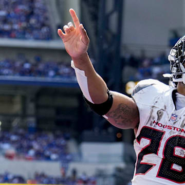 Houston Texans running back Joe Mixon (28) celebrates after scoring a touchdown Sunday, Sept. 8, 2024, during a game against the Indianapolis Colts at Lucas Oil Stadium in Indianapolis.