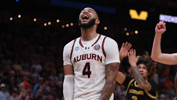 Auburn Tigers forward Johni Broome celebrates during a 34-8 second-half run against the Michigan Wolverines. 