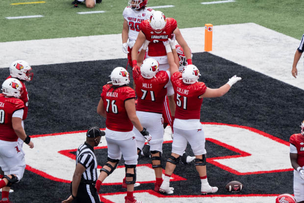 Louisville Cardinals celebrate another touchdown 