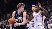 Nov 21, 2025; Salt Lake City, Utah, USA; Utah Jazz forward Lauri Markkanen (23) posts up against Oklahoma City Thunder guard Cason Wallace (22) during the second half at Delta Center. Mandatory Credit: Rob Gray-Imagn Images