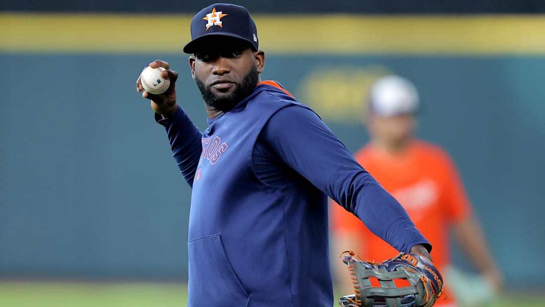 Houston Astros left fielder Yordan Alvarez warms up.