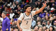 Dec 19, 2024; Toronto, Ontario, CAN;  Brooklyn Nets forward Cam Johnson (2) reacts after making a three point basket against the Toronto Raptors in the second half at Scotiabank Arena. Mandatory Credit: Dan Hamilton-Imagn Images