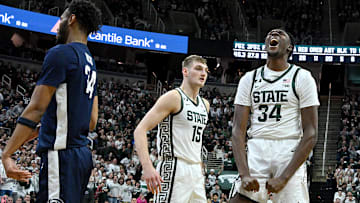 Michigan State Spartans forward Xavier Booker (34) celebrates a basket and foul against the Penn State Nittany Lions during the second half at Jack Breslin Student Events Center.