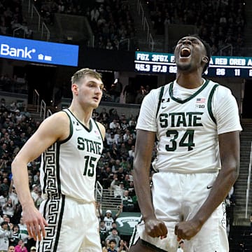 Michigan State Spartans forward Xavier Booker (34) celebrates a basket and foul against the Penn State Nittany Lions during the second half at Jack Breslin Student Events Center.