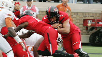 Nov 5, 2016; Lubbock, TX, USA;  Texas Tech Red Raiders quarterback Patrick Mahomes (5) rushes against the University of Texas Longhorns in the second half at Jones AT&T Stadium. UT defeated Texas Tech 45-37.  Mandatory Credit: Michael C. Johnson-Imagn Images
