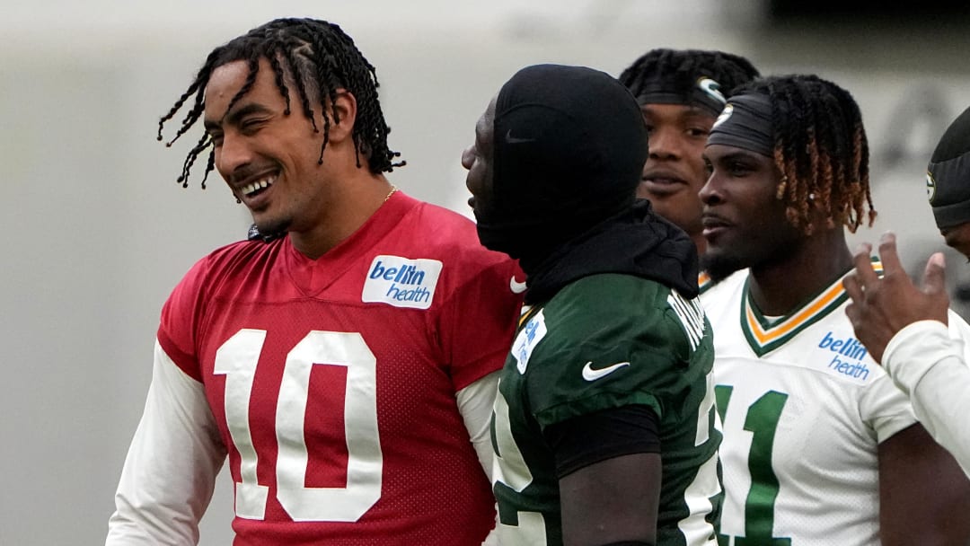 Jun 11, 2024; Green Bay, WI, USA; Green Bay Packers quarterback Jordan Love (10) laughs with teammates at minicamp. Mandatory Credit: Mark Hoffman-USA TODAY Sports