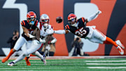 Nov 23, 2025; Cincinnati, Ohio, USA; Cincinnati Bengals cornerback Jalen Davis (35) and cornerback DJ Turner II (20) breaks up a pass to New England Patriots wide receiver Stefon Diggs (8) in the fourth quarter at Paycor Stadium. Mandatory Credit: Sam Greene-USA TODAY Network via Imagn Images