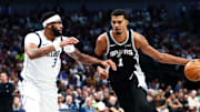 Oct 22, 2025; Dallas, Texas, USA;   San Antonio Spurs forward Victor Wembanyama (1) drives to the basket as Dallas Mavericks forward Anthony Davis (3) defends during the second half at American Airlines Center. Mandatory Credit: Kevin Jairaj-Imagn Images