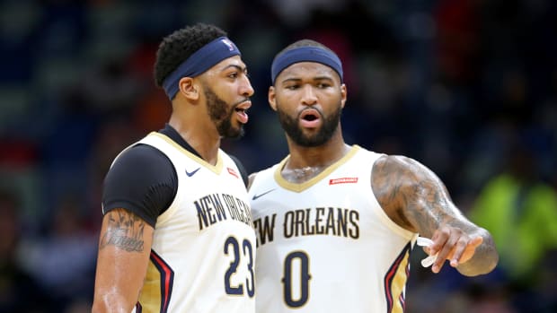 Nov 13, 2017; New Orleans, LA, USA; New Orleans Pelicans forward Anthony Davis (23) talks to center DeMarcus Cousins (0) in the second quarter against the Atlanta Hawks at the Smoothie King Center. Mandatory Credit: Chuck Cook-USA TODAY Sports