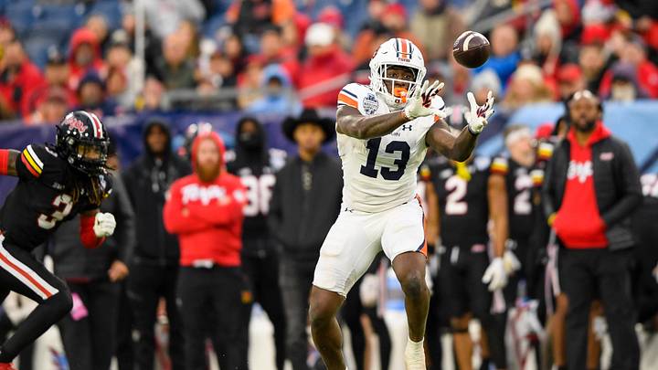 Dec 30, 2023; Nashville, TN, USA;  Auburn Tigers tight end Rivaldo Fairweather (13) makes a catch against the Maryland Terrapins during the second half at Nissan Stadium. Mandatory Credit: Steve Roberts-USA TODAY Sports