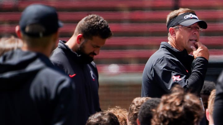 Cincinnati Bearcats head coach Scott Satterfield speaks with players after a scrimmage, Saturday, Aug. 10, 2024, at Nippert Stadium in Cincinnati.