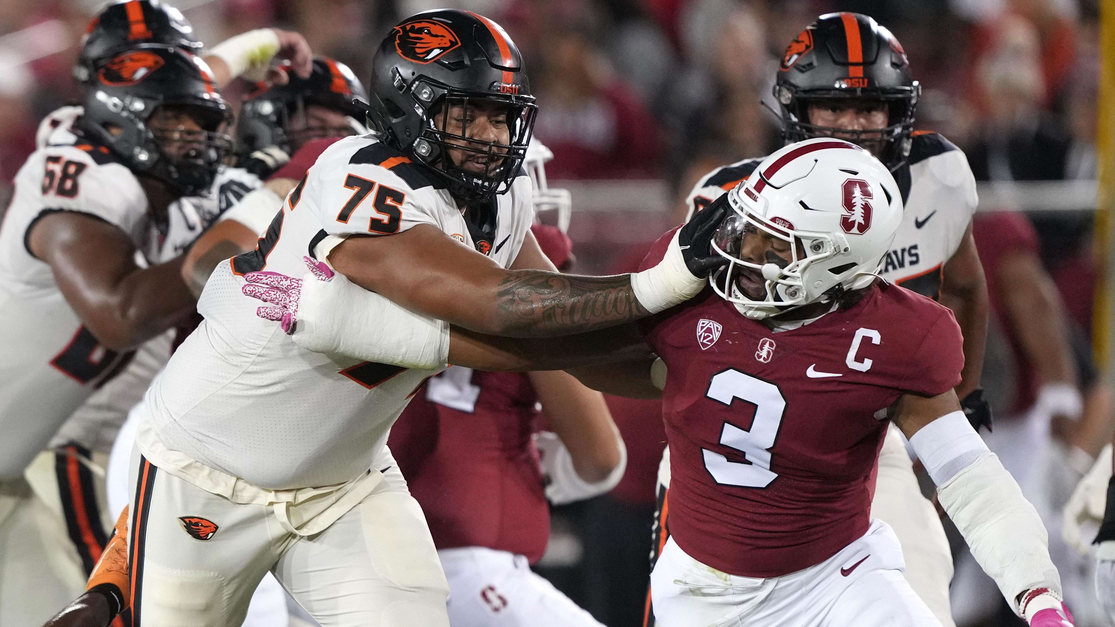 Oregon State Beavers offensive lineman Taliese Fuaga (75) blocks against the Stanford Cardinals.