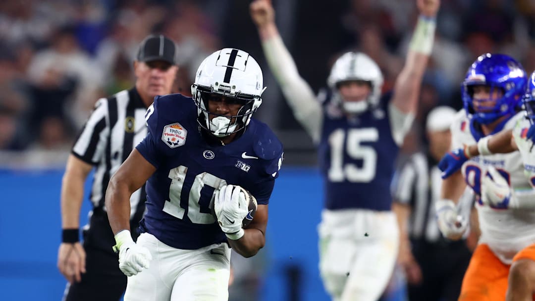 Penn State football running back Nicholas Singleton rushes for a touchdown against the Boise State Broncos during Fiesta Bowl