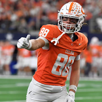 Celina's Wyatt Villarreal checks with the sideline referee during the 4A DI UIL Texas State Football Championship game against Kilgore on Friday, December 20, 2024 at AT&T Stadium in Arlington.