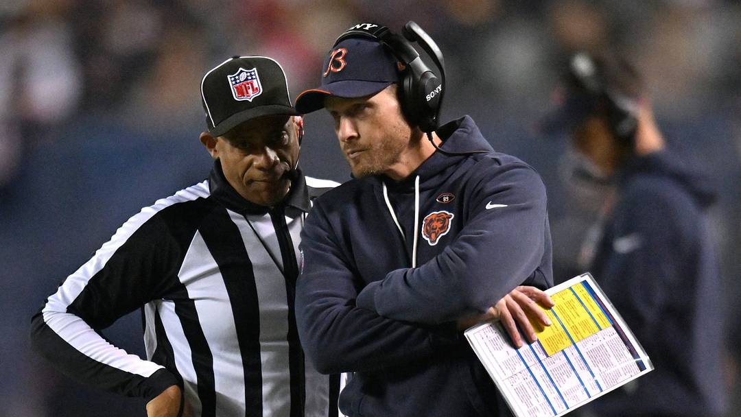 Oct 22, 2026; Chicago, Illinois, USA;  Chicago Bears head coach Ben Johnson talks with an official  during the first half against the New England Patriots at Soldier Field.  Mandatory Credit: Patrick Gorski-Imagn Images