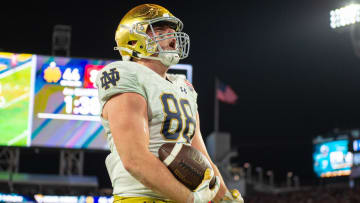 Dec 30, 2022; Jacksonville, FL, USA;Notre Dame Fighting Irish tight end Mitchell Evans (88) celebrates his touchdown against the South Carolina Gamecocks in the fourth quarter in the 2022 Gator Bowl at TIAA Bank Field. Mandatory Credit: Jeremy Reper-USA TODAY Sports