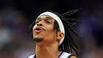 Dec 17, 2024; Kansas City, Missouri, USA; Kansas State Wildcats guard Dug McDaniel (0) celebrates during the second half against the Drake Bulldogs at T-Mobile Center. Mandatory Credit: Jay Biggerstaff-Imagn Images