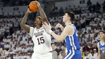 Feb 27, 2024; Starkville, Mississippi, USA; Mississippi State Bulldogs forward Jimmy Bell Jr. (15) shoots as Kentucky Wildcats forward Zvonimir Ivisic (44) defends during the first half at Humphrey Coliseum. Mandatory Credit: Petre Thomas-Imagn Images
