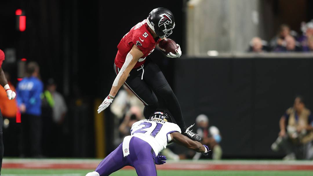 Oct 11, 2026; Atlanta, Georgia, USA;  Atlanta Falcons wide receiver Drake London (5) is tackled by Baltimore Ravens safety Jaylinn Hawkins (21) during the third quarter at Mercedes-Benz Stadium.  Mandatory Credit: Brett Davis-Imagn Images