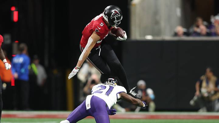 Oct 11, 2026; Atlanta, Georgia, USA;  Atlanta Falcons wide receiver Drake London (5) is tackled by Baltimore Ravens safety Jaylinn Hawkins (21) during the third quarter at Mercedes-Benz Stadium.  Mandatory Credit: Brett Davis-Imagn Images