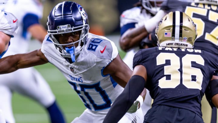 Aug 25, 2024; New Orleans, Louisiana, USA;  Tennessee Titans wide receiver Bryce Oliver (80) blocks New Orleans Saints cornerback Rico Payton (36) on a kick off during the second half at Caesars Superdome. Mandatory Credit: Stephen Lew-USA TODAY Sports