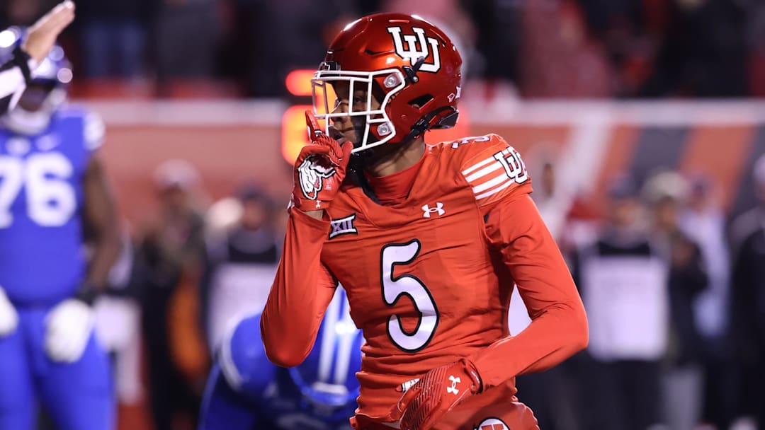 Nov 9, 2024; Salt Lake City, Utah, USA; Utah Utes cornerback Zemaiah Vaughn (5) reacts after a sack against the Brigham Young Cougars during the second half at Rice-Eccles Stadium.