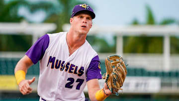 Fort Myers Mighty Mussels outfielder Walker Jenkins (27) catches a ball from the dugout during the second inning of a game against the Tampa Tarpons at Hammond Stadium in Fort Myers, Fla., on June 28, 2024.