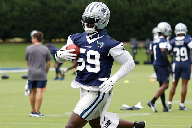 Dallas Cowboys LB Kenneth Murray Jr. goes through a drill during practice at the Ford Center at the Star Training Facility. Dallas Cowboys LB Kenneth Murray Jr. goes through a drill during practice at the Ford Center at the Star Training Facility.