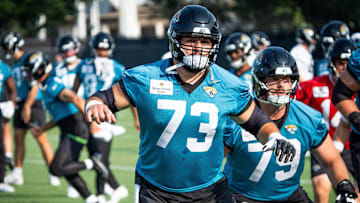 Jacksonville Jaguars center Robert Hainsey (73) warms up with Jacksonville Jaguars center Luke Fortner (79) during the seventh organized team activity at the Miller Electric Center in Jacksonville, Fla. Monday, June 2, 2025. [Doug Engle/Florida Times-Union]