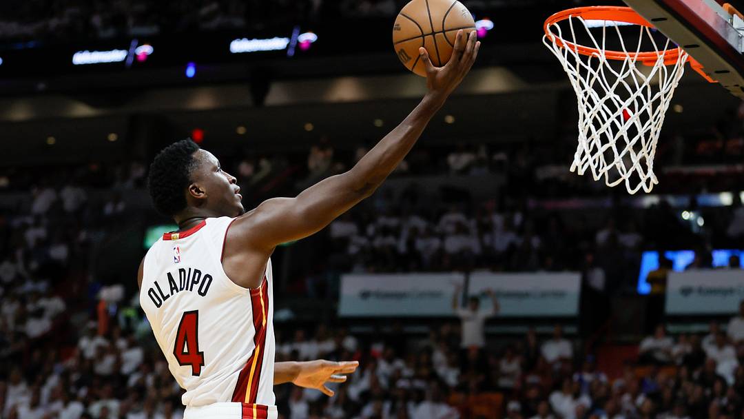 Apr 22, 2023; Miami, Florida, USA; Miami Heat guard Victor Oladipo (4) drives to the basket in the fourth quarter against the Milwaukee Bucks during game three of the 2023 NBA Playoffs at Kaseya Center. Mandatory Credit: Sam Navarro-USA TODAY Sports