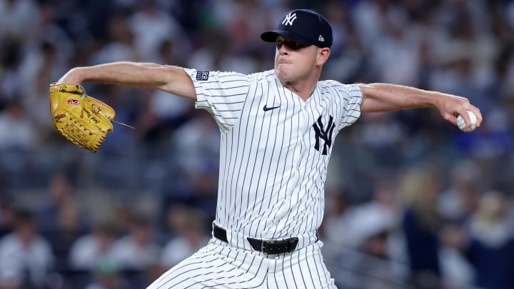 Jun 9, 2024; Bronx, New York, USA; New York Yankees relief pitcher Caleb Ferguson (64) pitches against the Los Angeles Dodgers during the sixth inning at Yankee Stadium.