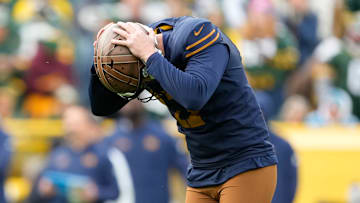 Green Bay Packers kicker Brandon McManus hangs his head after missing a field goal against the Carolina Panthers