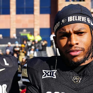 Nov 29, 2024; Boulder, Colorado, USA; Colorado Buffaloes quarterback Shedeur Sanders (2) and safety Shilo Sanders (21) before the game against the Oklahoma State Cowboys at Folsom Field. Mandatory Credit: Ron Chenoy-Imagn Images