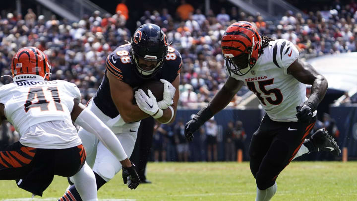 Aug 17, 2024; Chicago, Illinois, USA; Chicago Bears tight end Stephen Carlson (88) catches a pass as Cincinnati Bengals linebacker Maema Njongmeta (45) defends him during the second half at Soldier Field. Mandatory Credit: David Banks-USA TODAY Sports