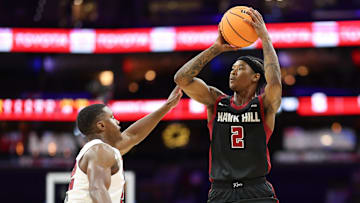 Dec 6, 2025; Philadelphia, PA, USA; Saint Joseph's Hawks guard Deuce Jones II (2) shoots against Temple Owls guard Derrian Ford (22) during the first half at Xfinity Mobile Arena. Mandatory Credit: Bill Streicher-Imagn Images